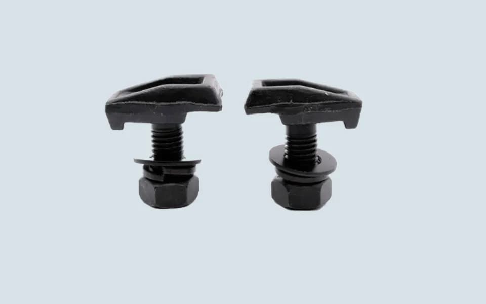 Front view of an elevator guide rail clip